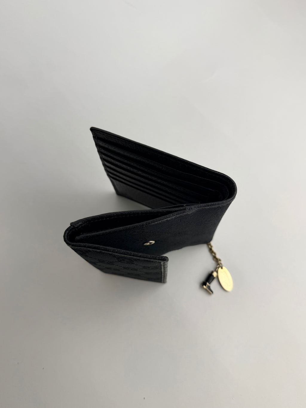 Gucci Black Monogram Charm Trifold Wallet