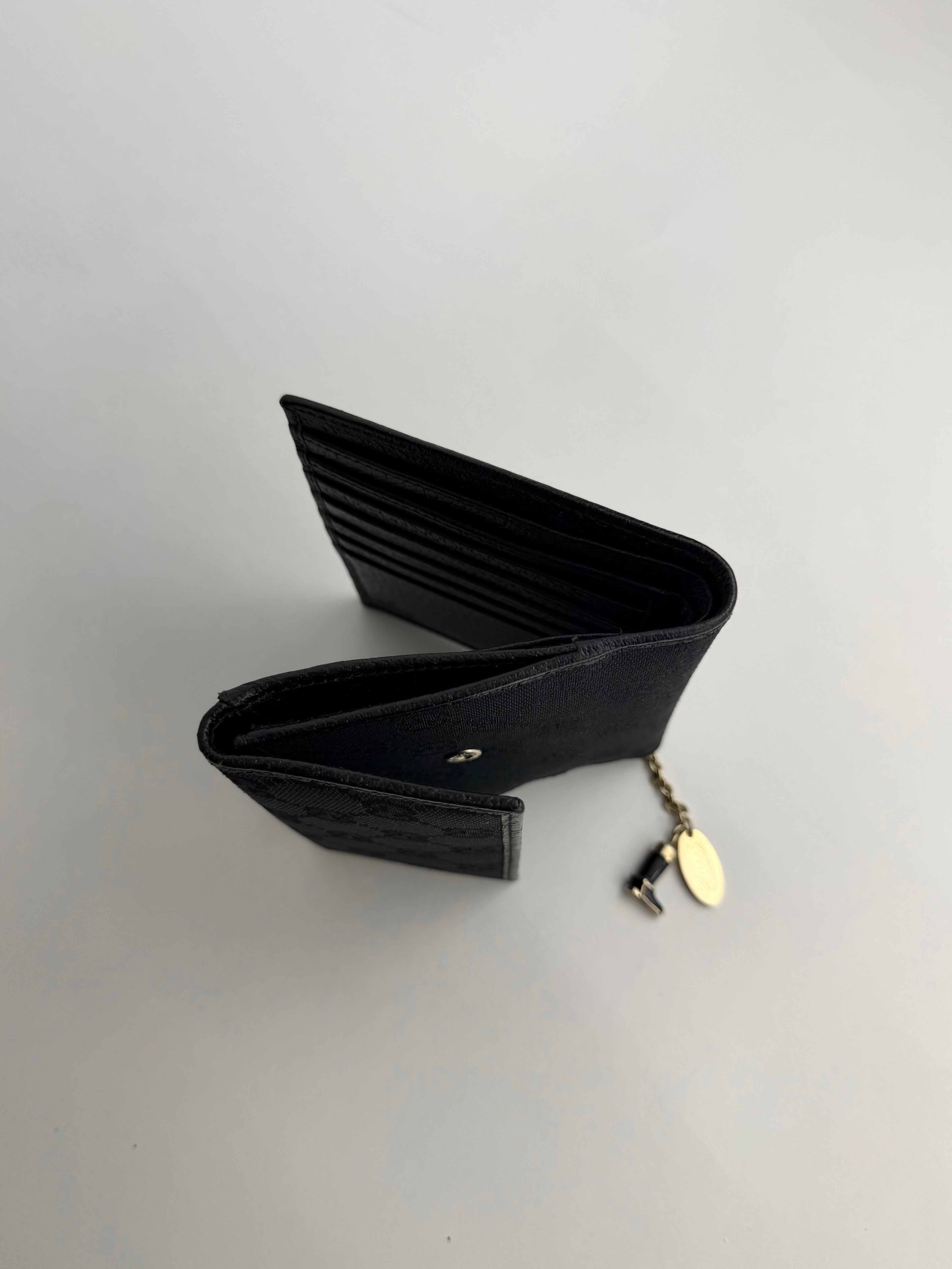 Gucci Black Monogram Charm Trifold Wallet