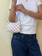 Louis Vuitton Pochette Accessoires Mini in Damier Ebene