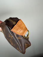 Louis Vuitton Pochette Accessoires Mini in Classic Monogram