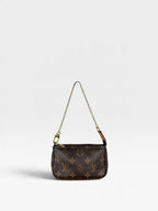 Louis Vuitton Pochette Accessoires Mini in Classic Monogram