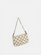 Louis Vuitton Pochette Accessoires Mini in Damier Ebene